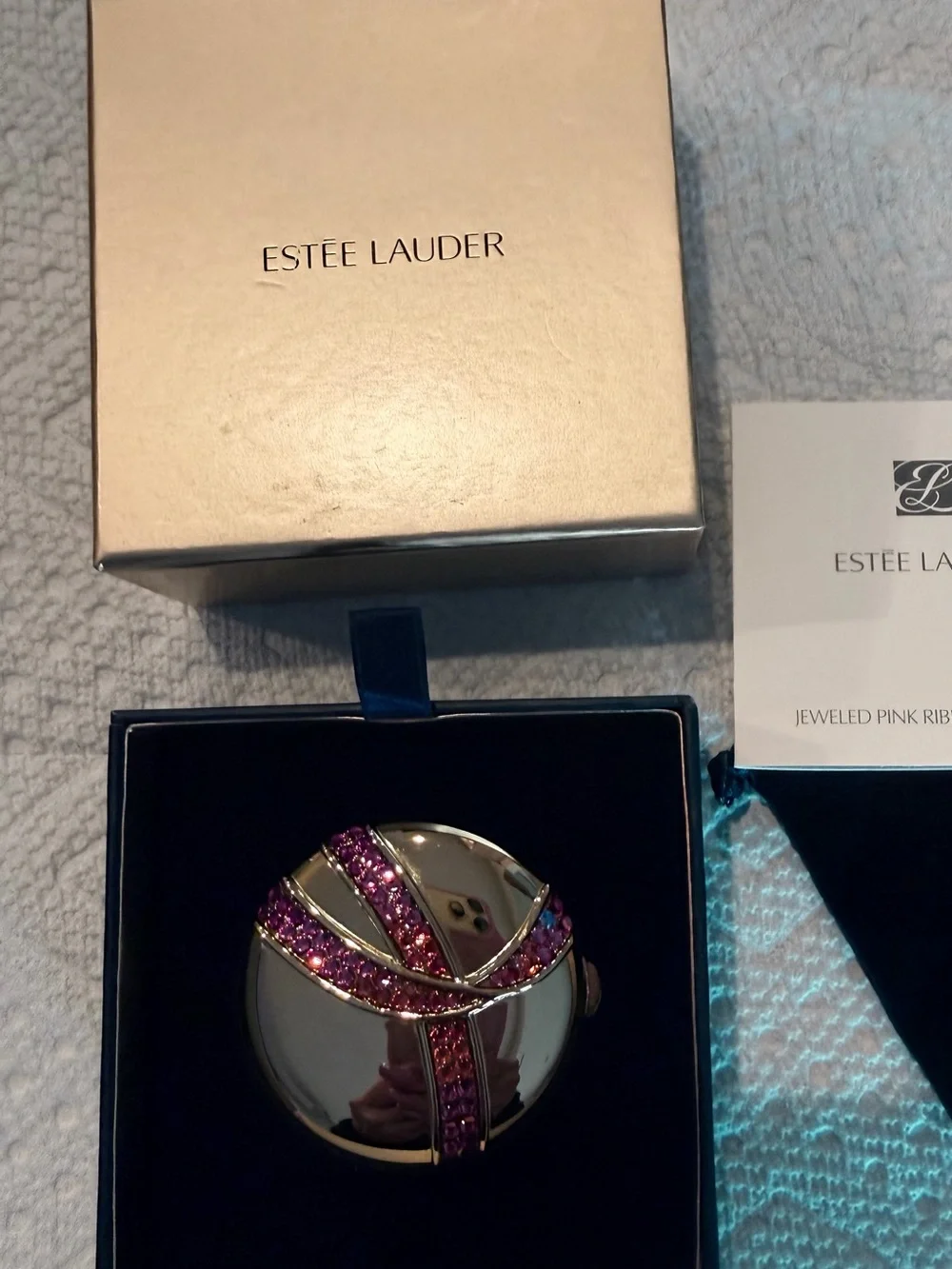 Estée Lauder pink ribbon compact